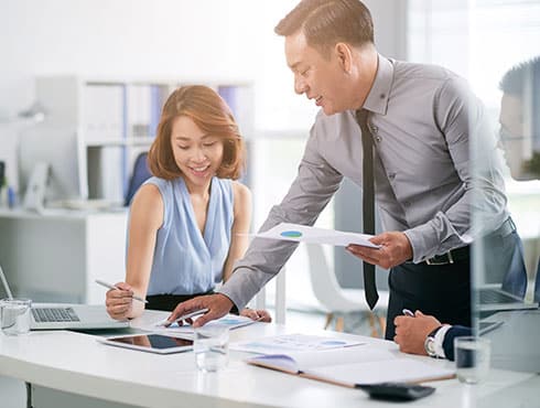 two workers in an office